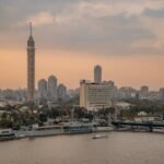مشهد النيل والمباني في القاهرة، صورة توضيحية لدليل تحصيل الديون التجارية في مصر