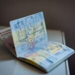 جواز سفر يحمل أختام سفر لتحديث ونقل بيانات الإقامة في مصر